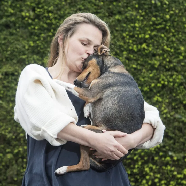 Maria with her rescue dog
